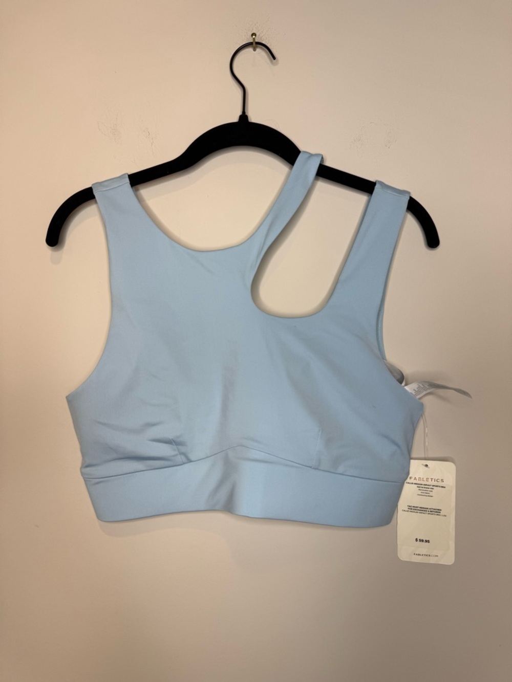 Fabletics Callie Medium Impact Sports Bra in the color Sky Way